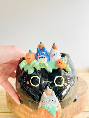 Black cat pot with Totoro and pumpkin friends