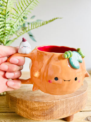 Pumpkin mug with ghost friend