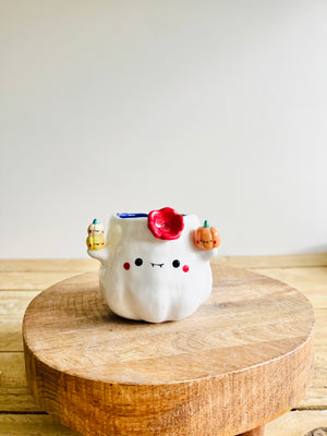 Ghost pot with pumpkin friends