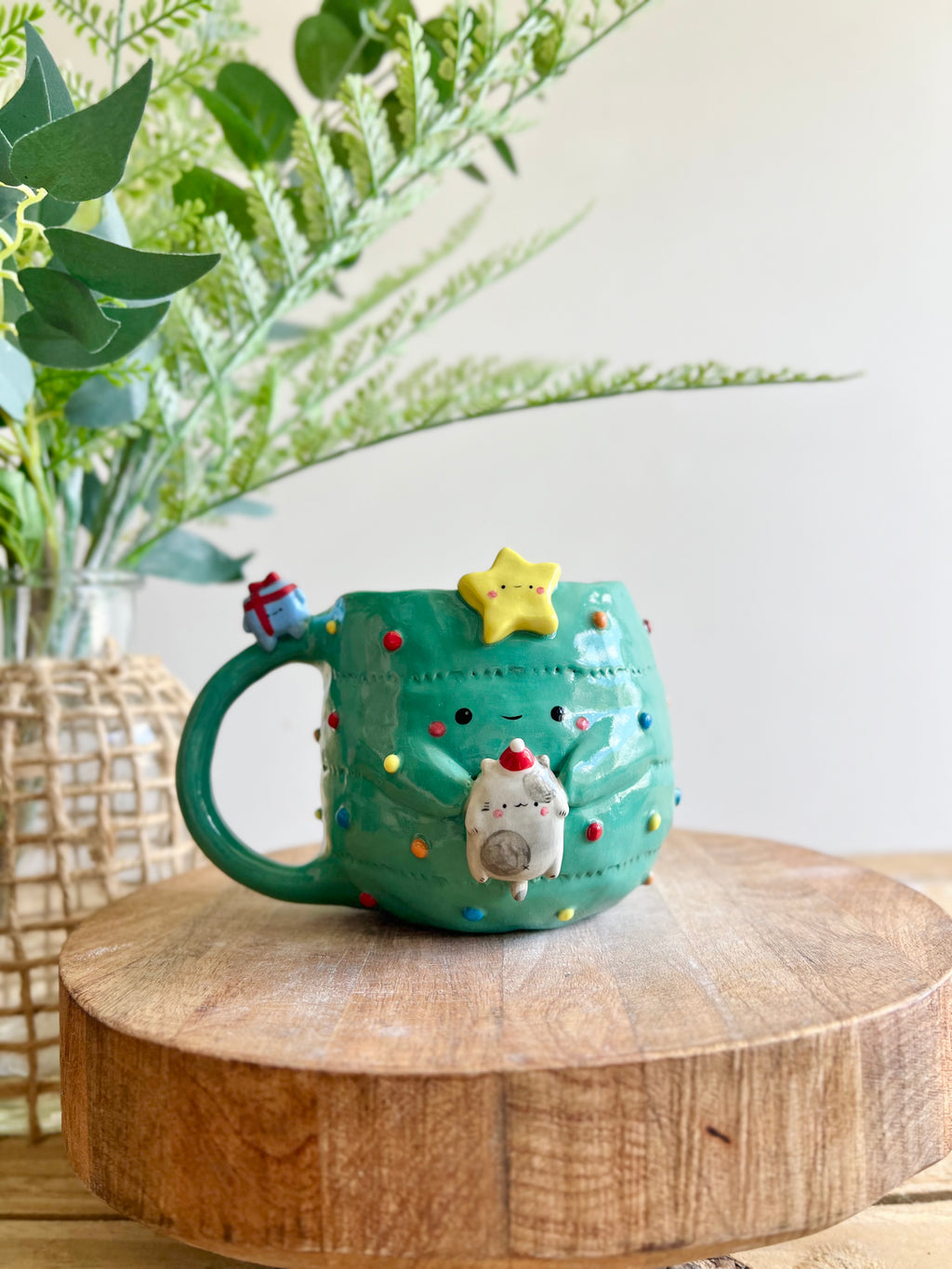 Christmas tree mug with grey cat and present friend