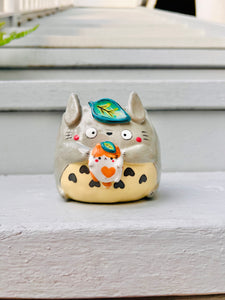 Totoro pot with cat friend