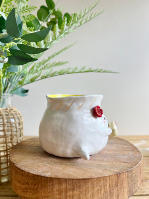 Flowery dumpling pot with baby dumpling