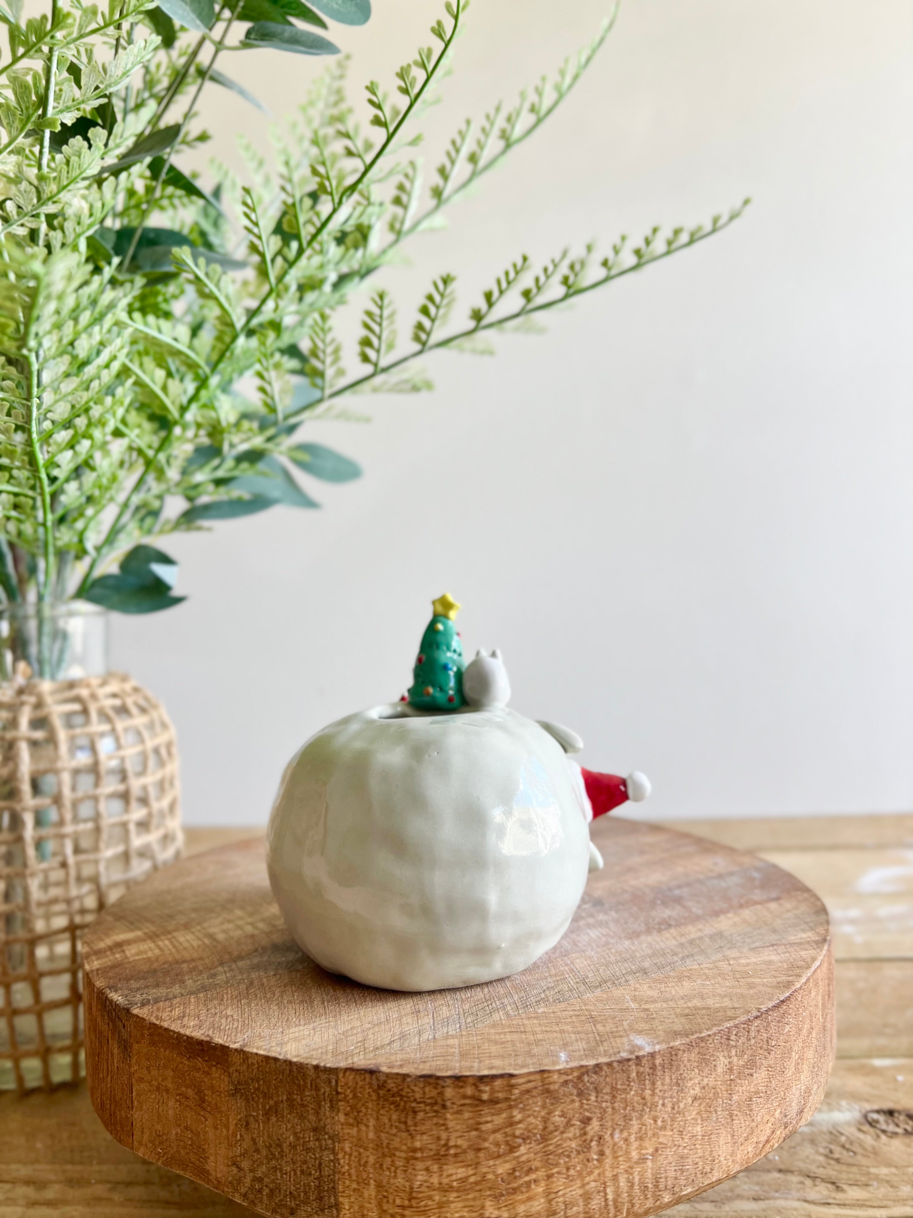 Festive sideways Totoro vase