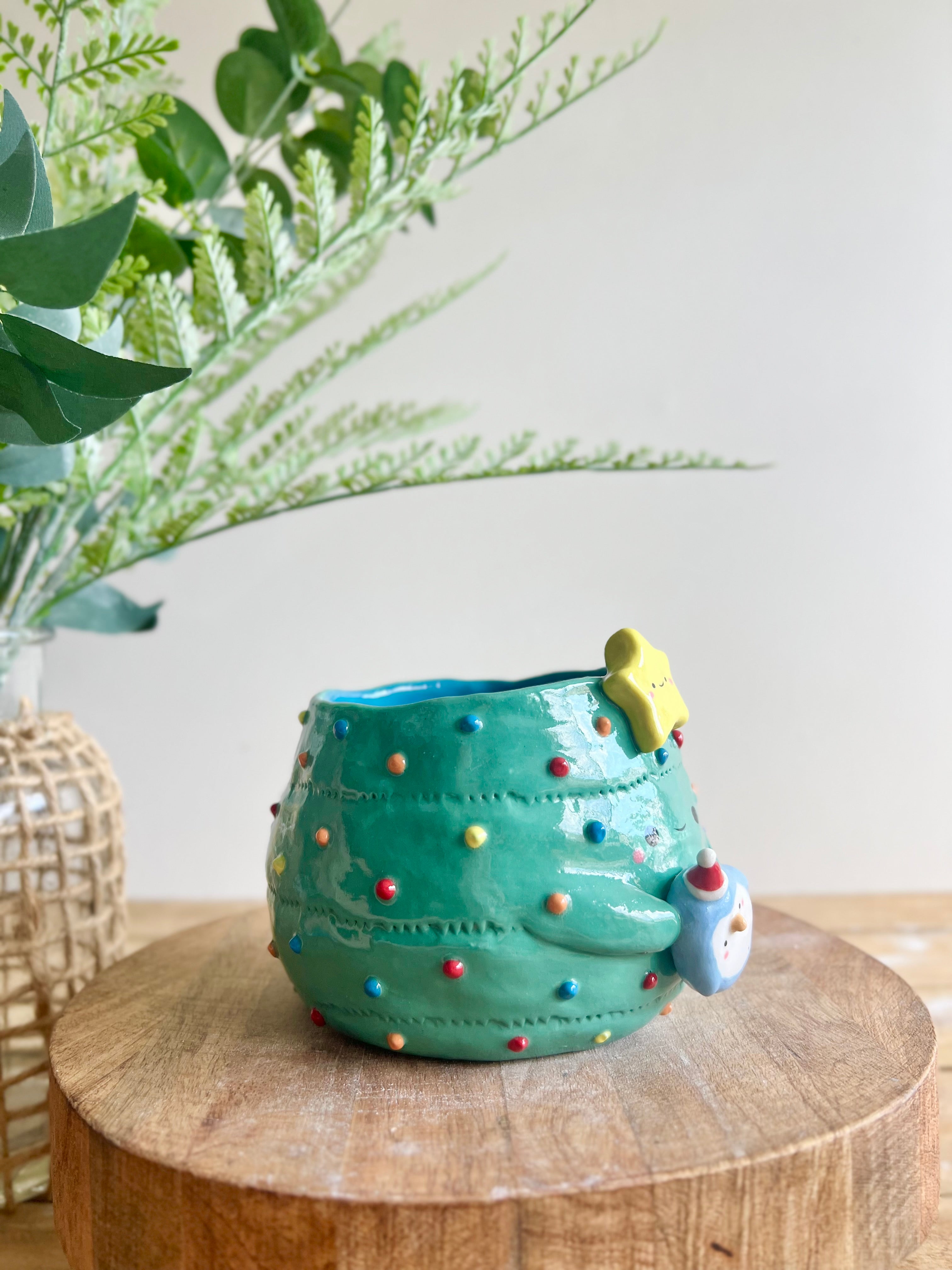 Christmas tree pot with penguin friend