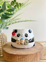 Flowery panda pot with bubble tea and animal friends