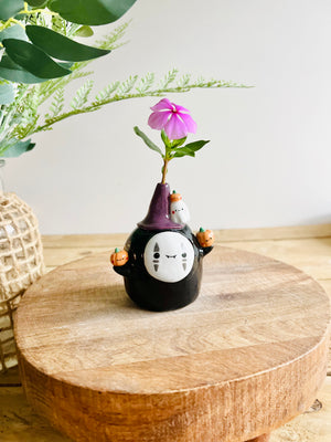 No Face witch with ghost and pumpkin friends bud vase