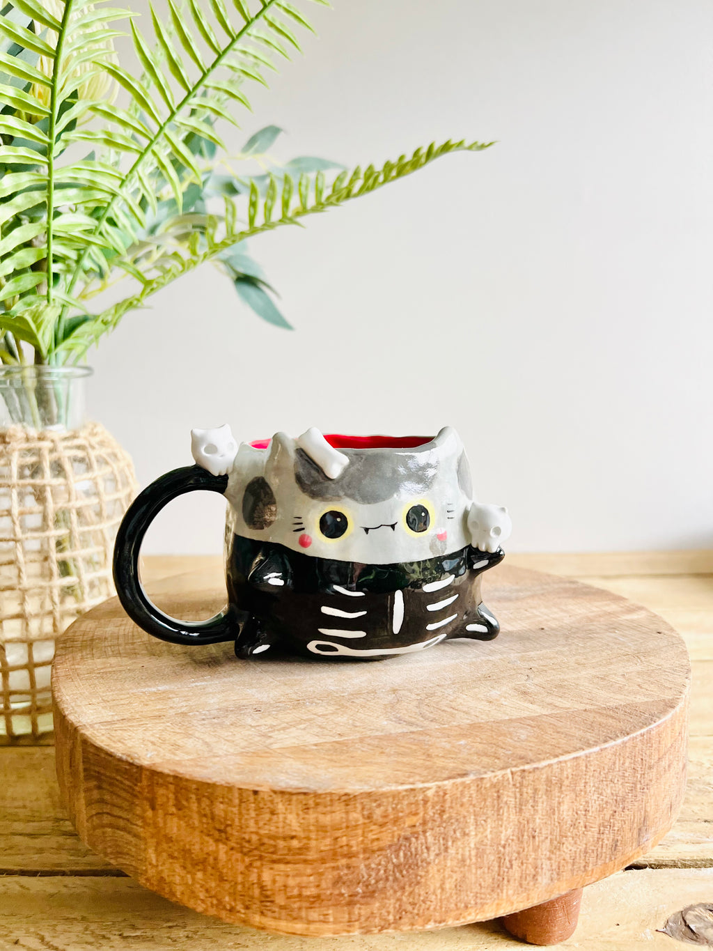 Skeleton kitty mug with cat skull friends