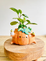 Pumpkin pot with ghost and baby pumpkin friends