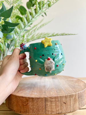 Christmas tree mug with grey cat and present friend