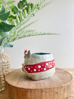 Festive grey bunny pot with gingerbread friend