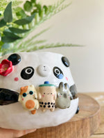 Flowery panda pot with bubble tea and animal friends