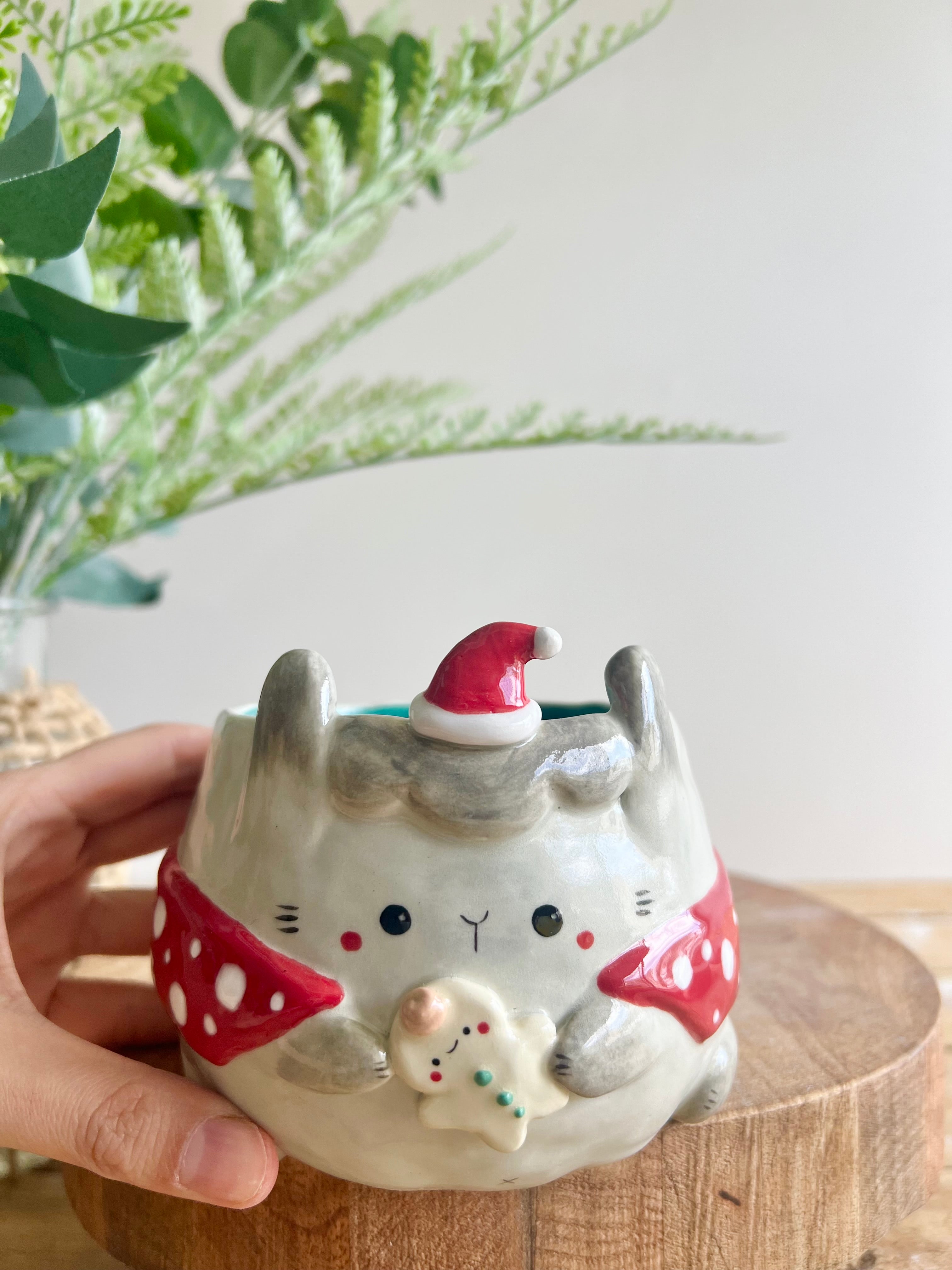 Festive grey bunny pot with gingerbread friend