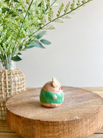 Green Christmas sweater reindeer bud vase