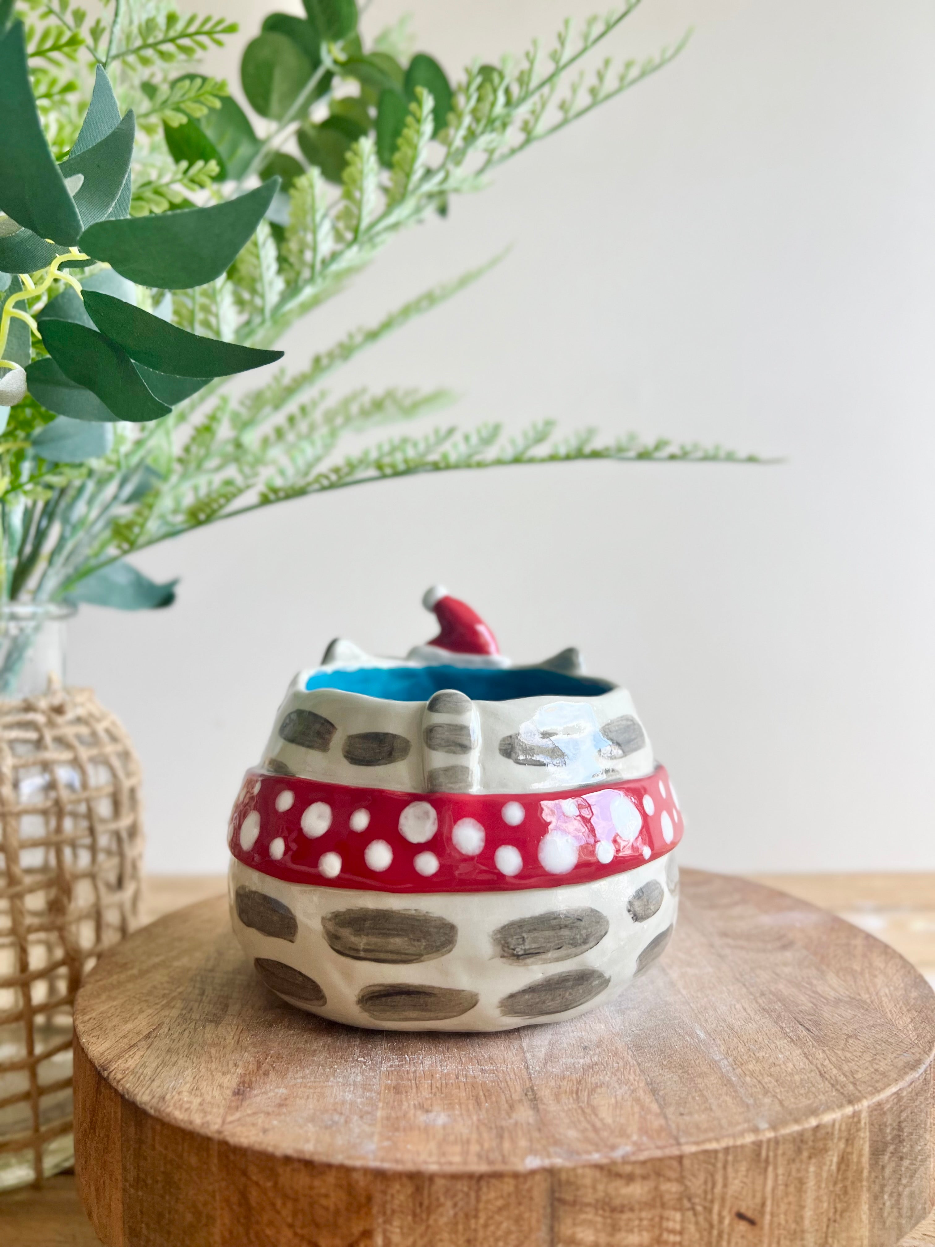 Festive grey cat pot with gingerbread friend