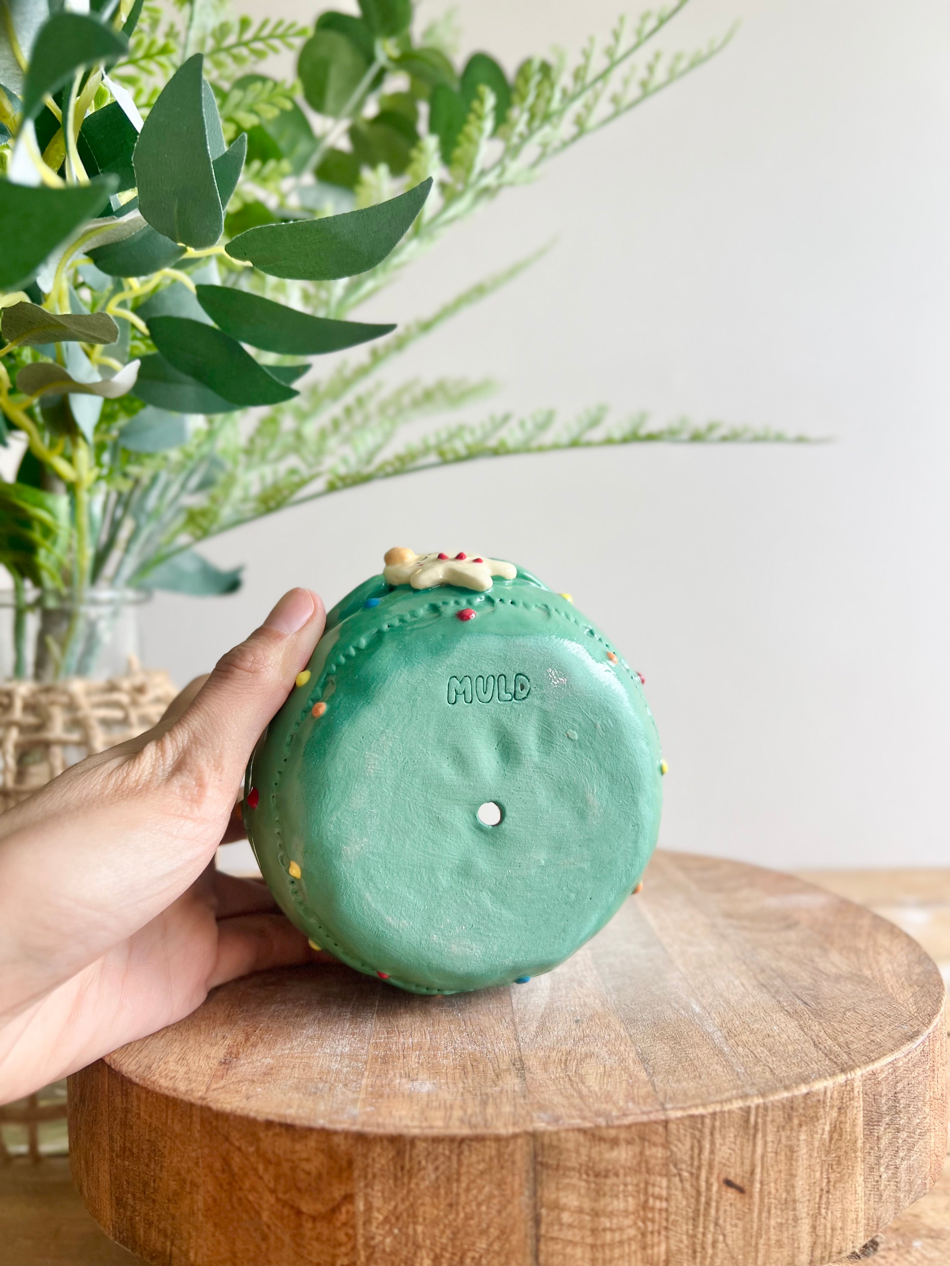 Christmas tree planter with gingerbread friend