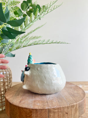 Festive sideways Totoro pot with Chibi Totoro friends