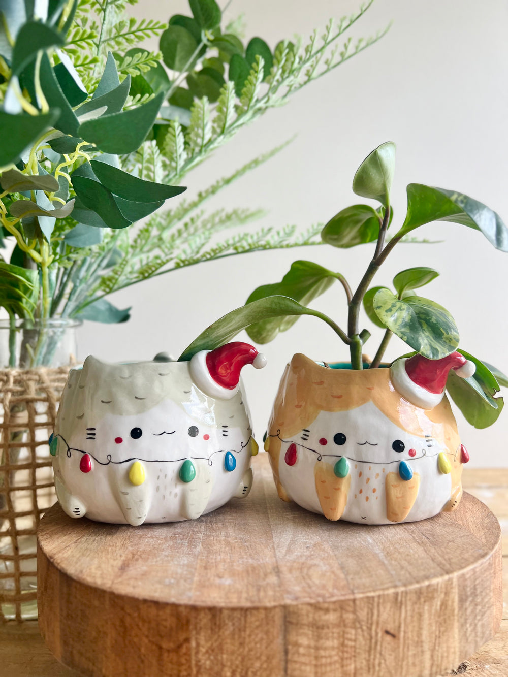 Festive grey cat pot adorned with Christmas lights, photo 11 of 11