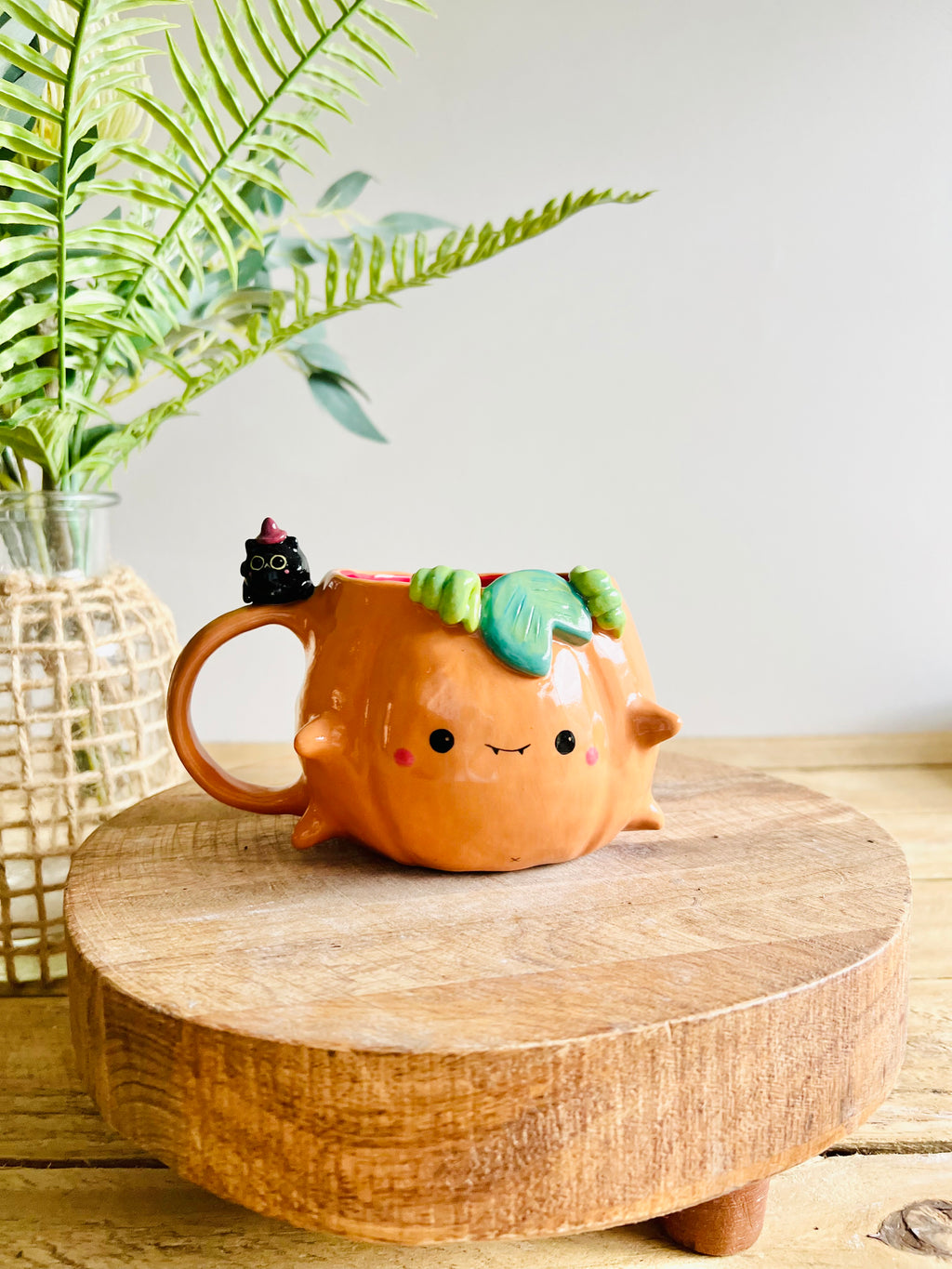 Pumpkin mug with black cat friend