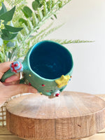 Christmas tree mug with grey cat and present friend