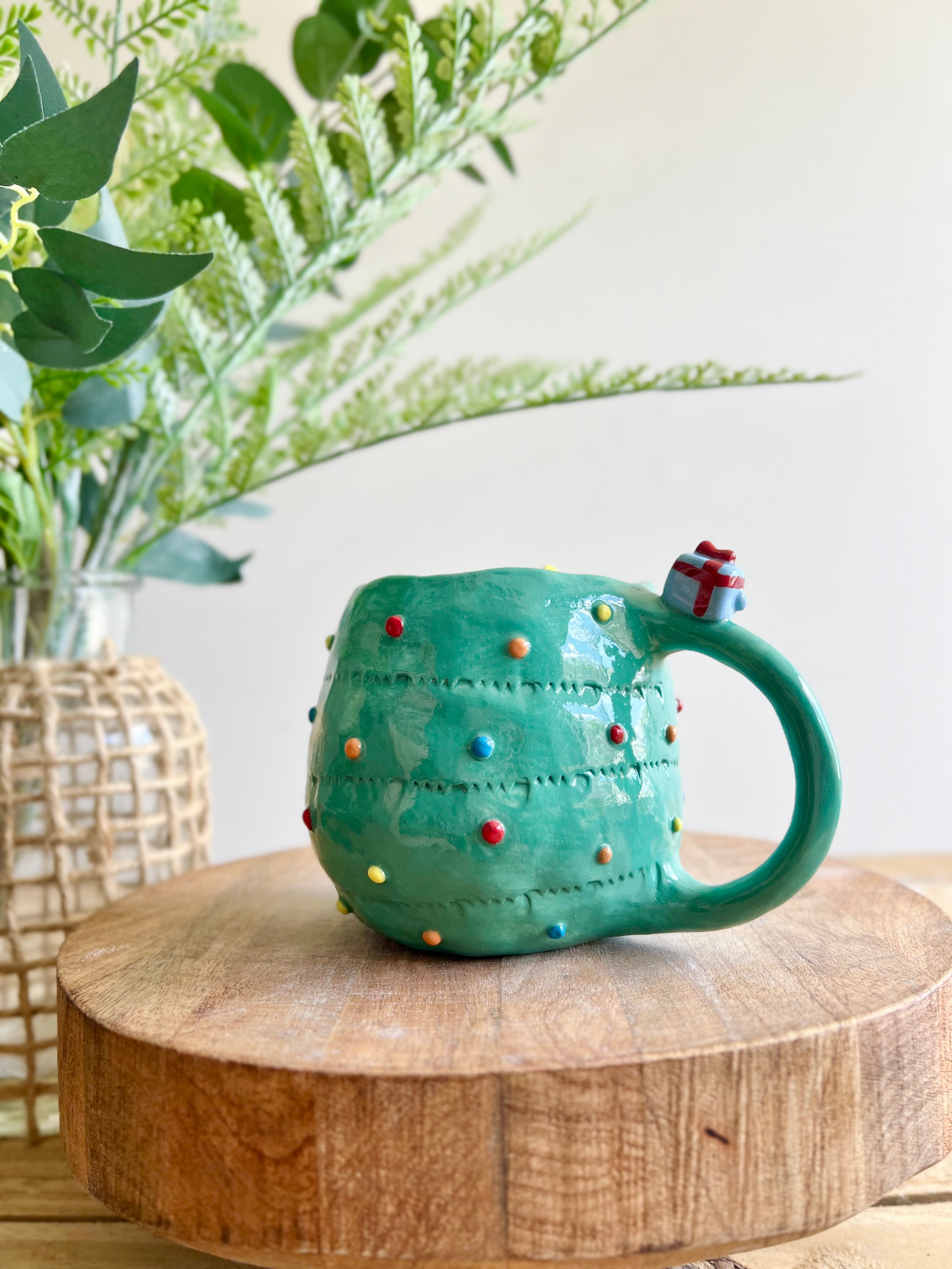 Christmas tree mug with grey cat and present friend