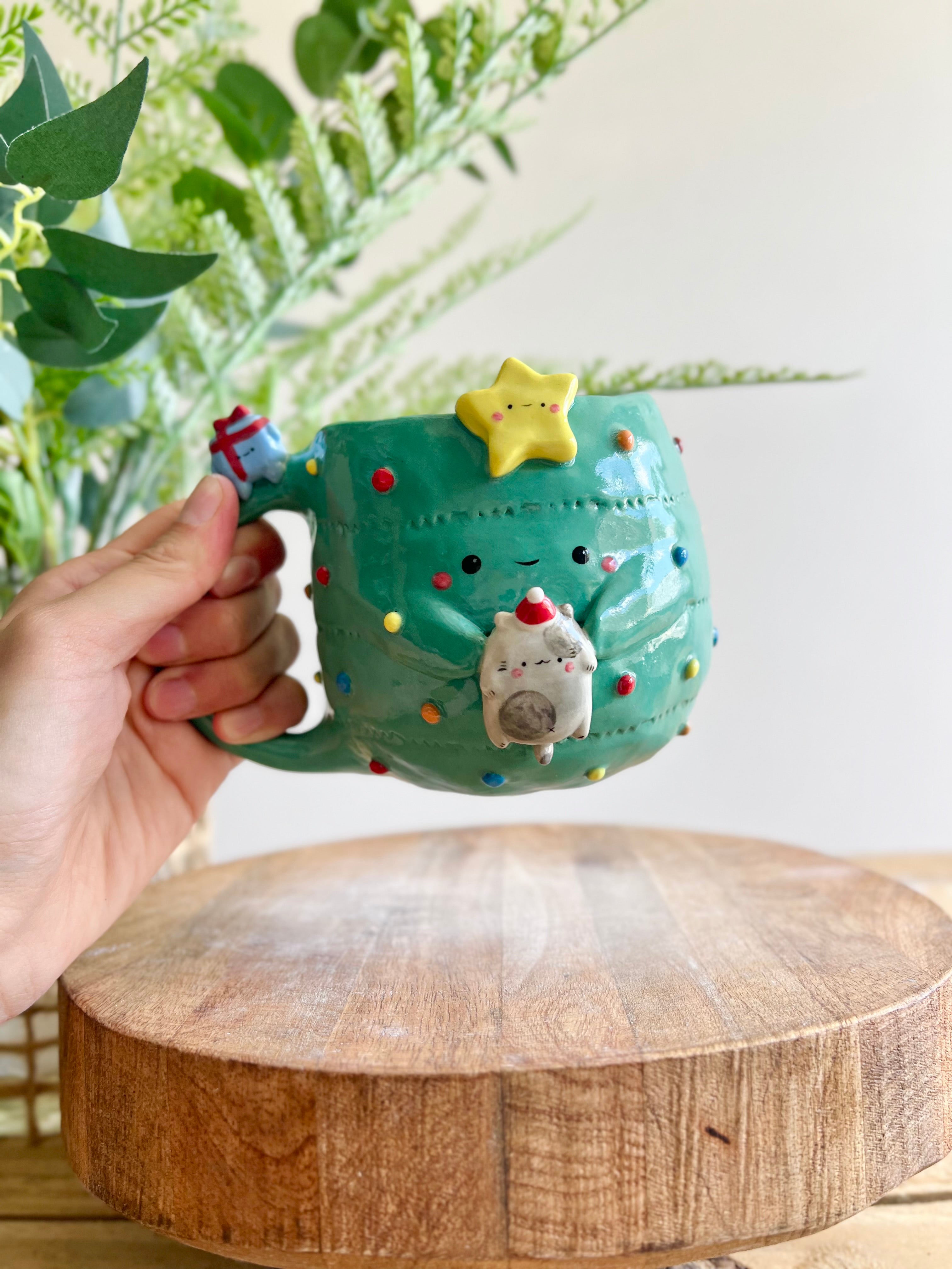 Christmas tree mug with grey cat and present friend