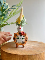 Long tiger bud vase