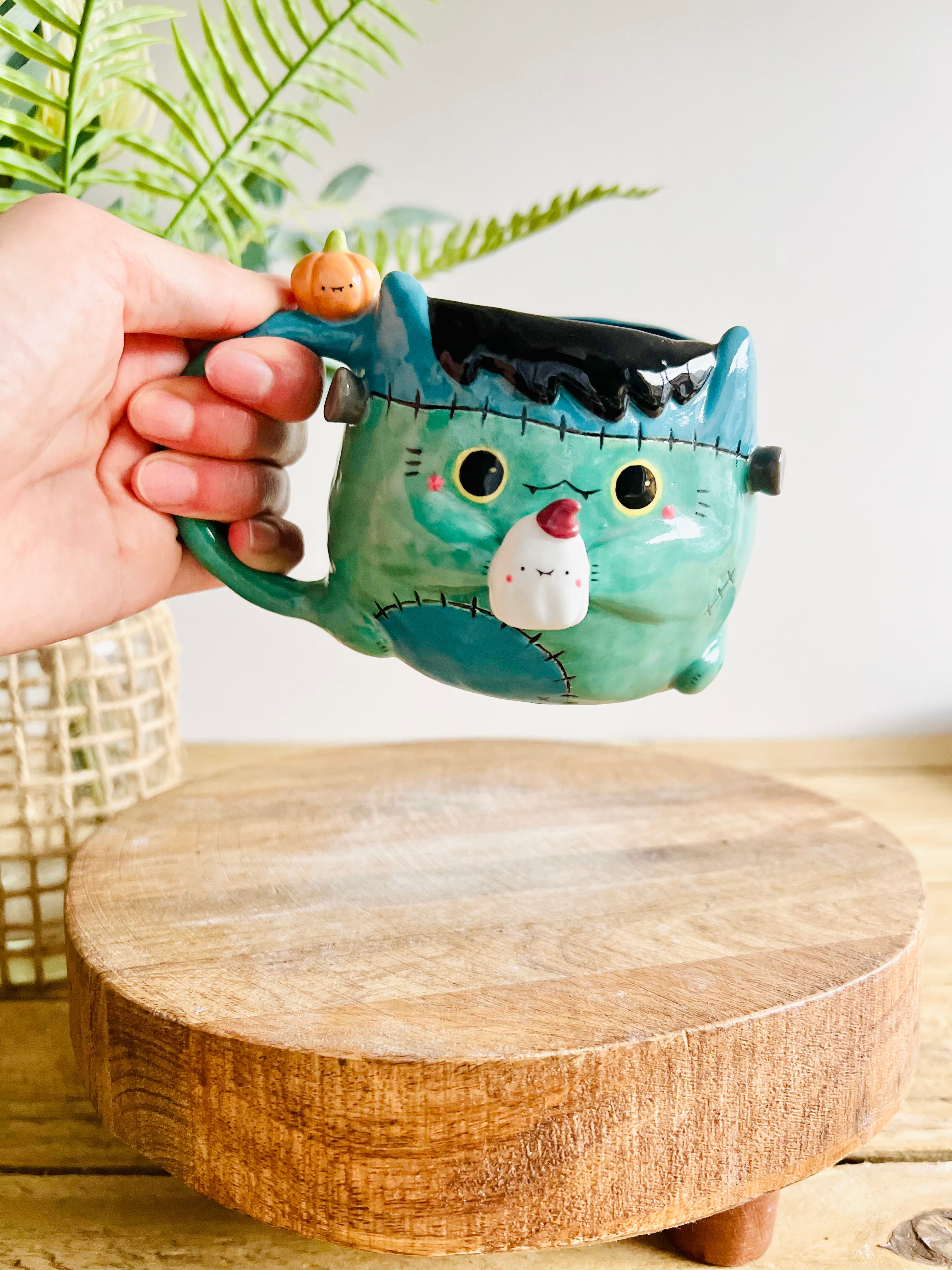 Franken-kitty mug with ghost friend