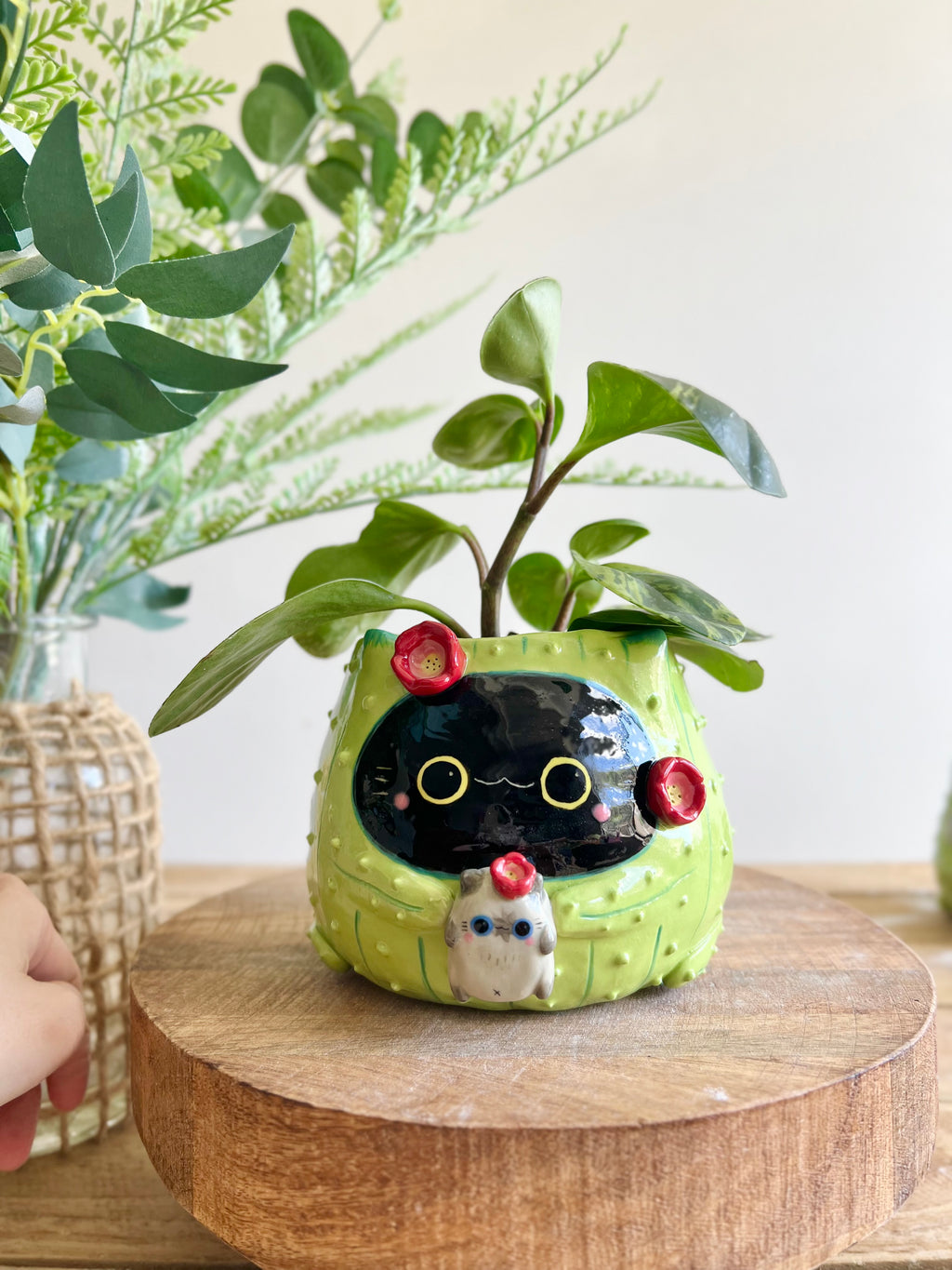 Flowery black CAT-us pot with grey cat friend