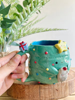 Christmas tree mug with grey cat and present friend