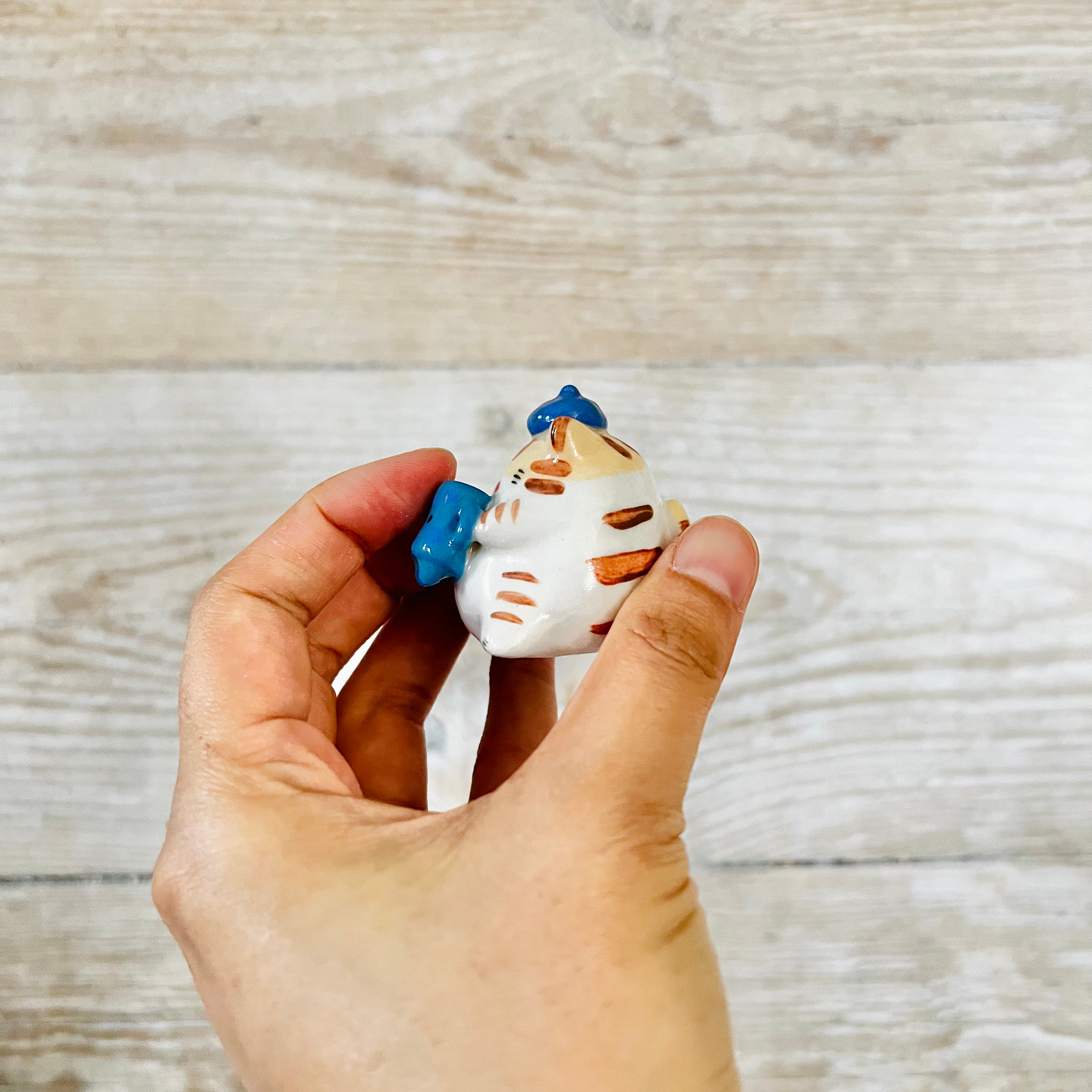 Blue beret coffee cat desk friend