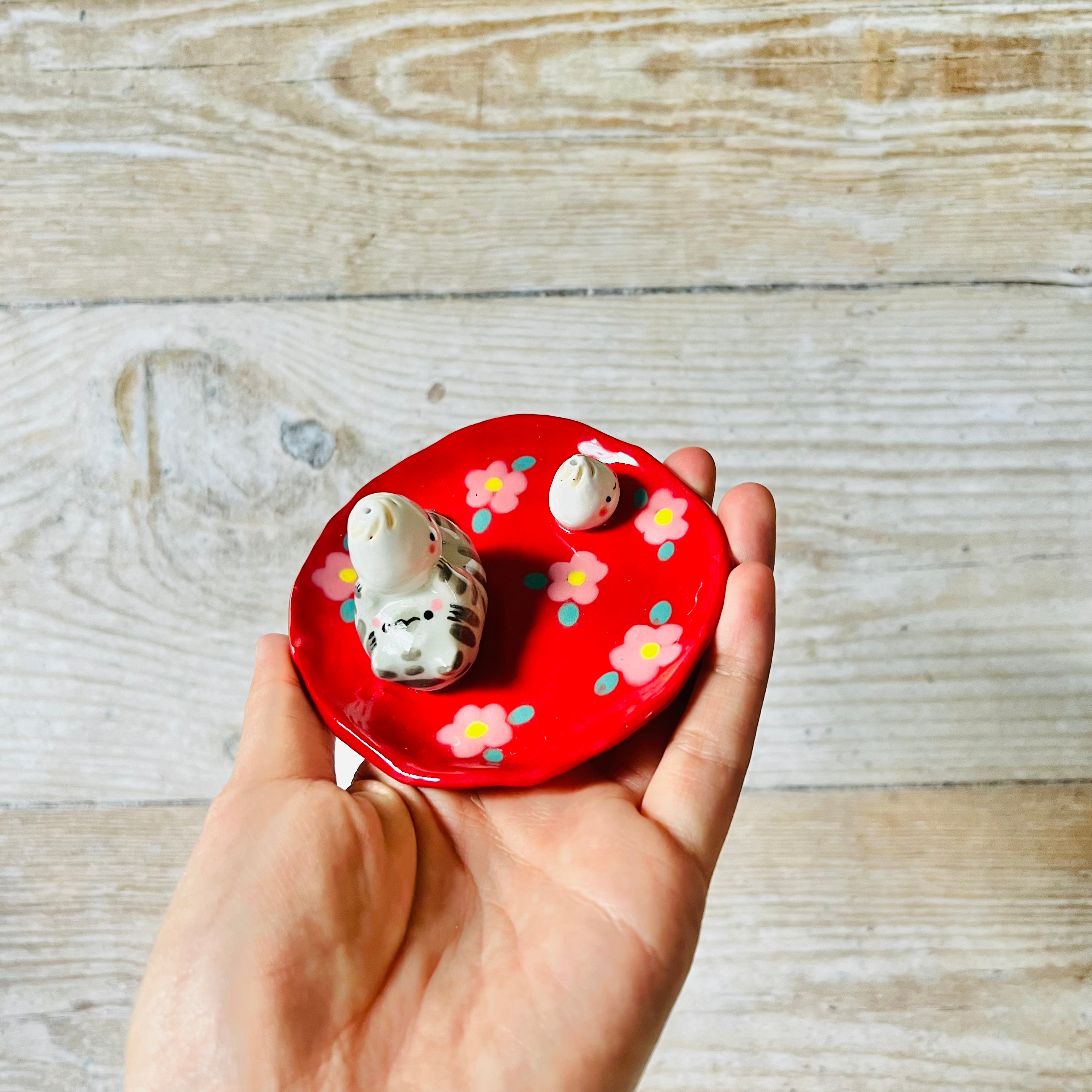 Red flowery cat with dumplings trinket dish