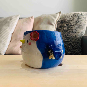 Flowery Penguin Pot with Fish and Armpit Puggo Friend