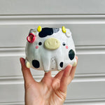 Flowery cow pot