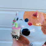 Spotty cat with bubble tea mug