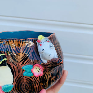 Happy flowery tree with bees and sleepy cats planter