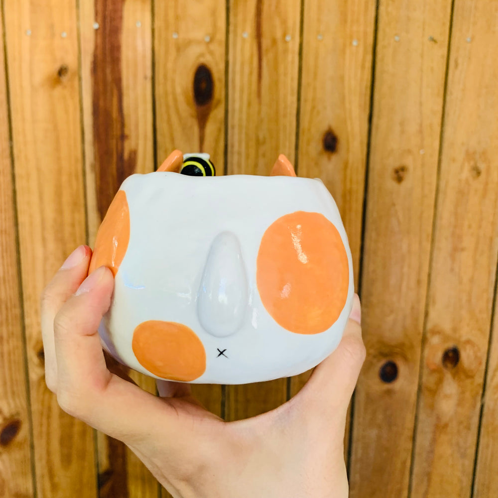 Orange spotty doggo pot with bee friends, photo 4 of 9