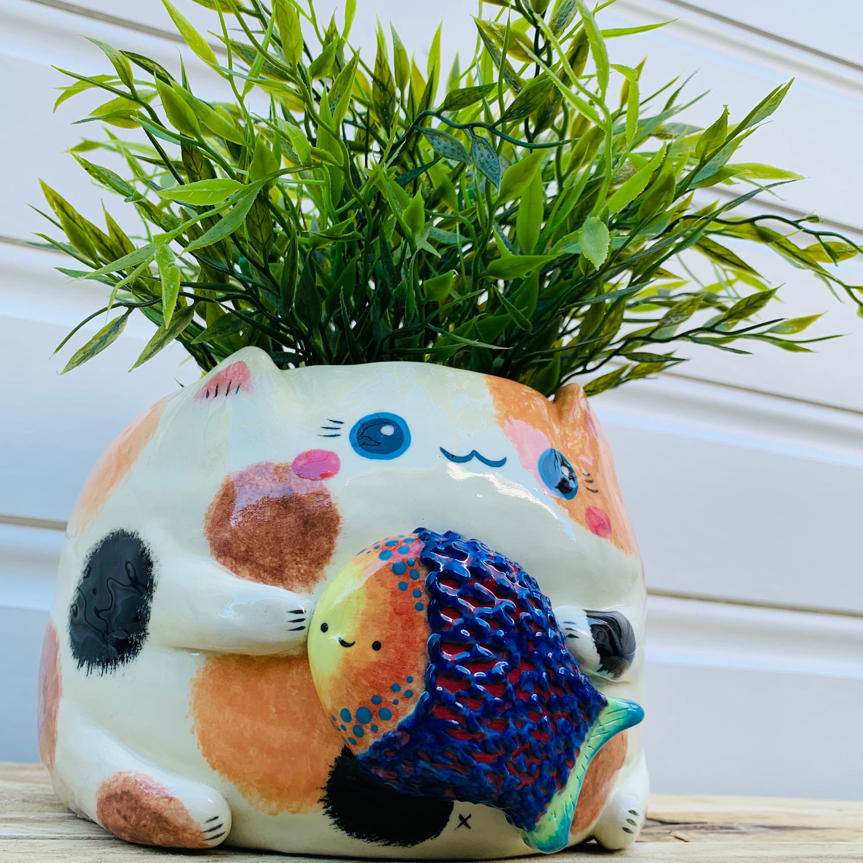 LARGE spotty cat with fish friend planter