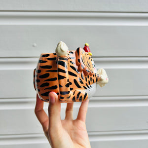 Hat wearing tiger mug with dumpling friends