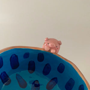 Friendly sloth snack bowl with pig friend