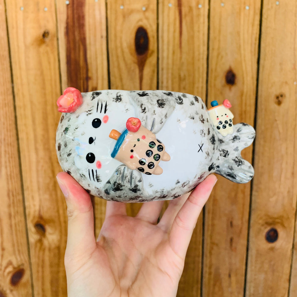 Chubby spotted seal with bubble tea friends pot, photo 1 of 7