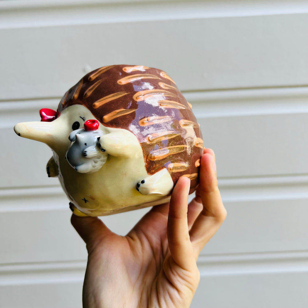 Flowery Echidna pot with Puggle baby, photo 3 of 5
