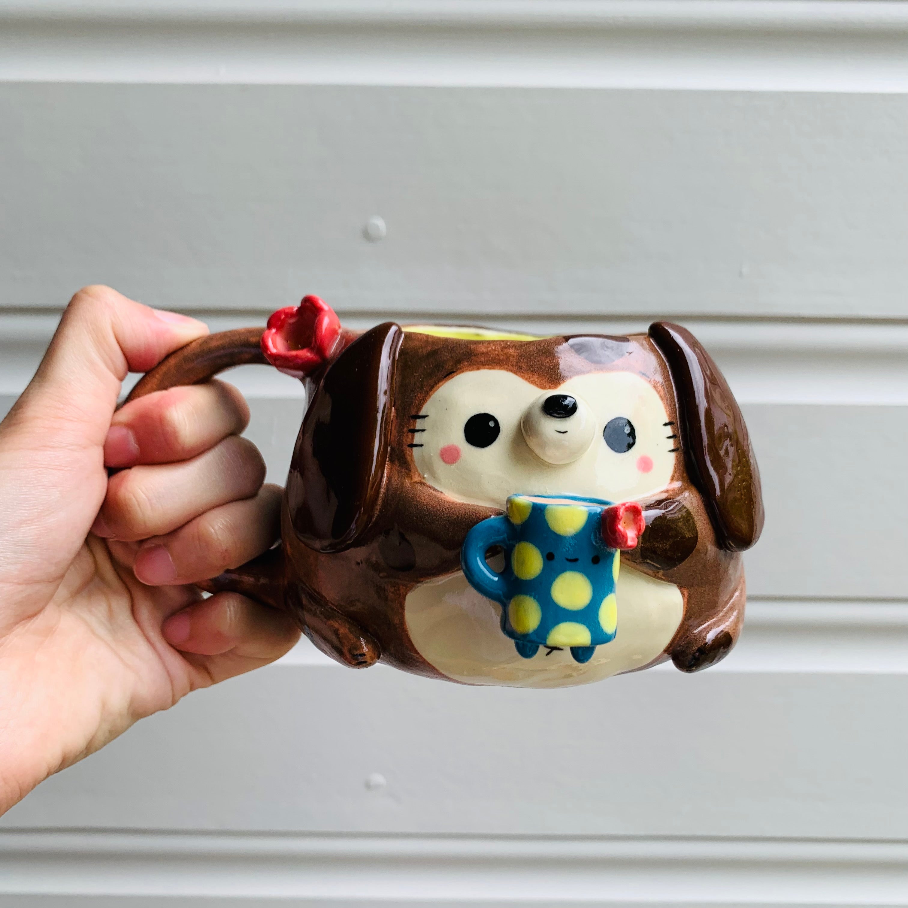 Brown DOGGO coffee pun mug with mug friend