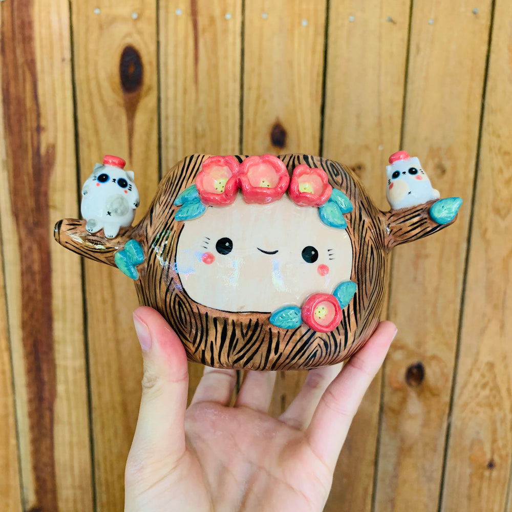 Happy tree pot with spotty cat friends, photo 1 of 9