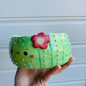 Flowery cactus bowl with cat friend