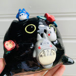 Flowery black cat pot with Totoro friends