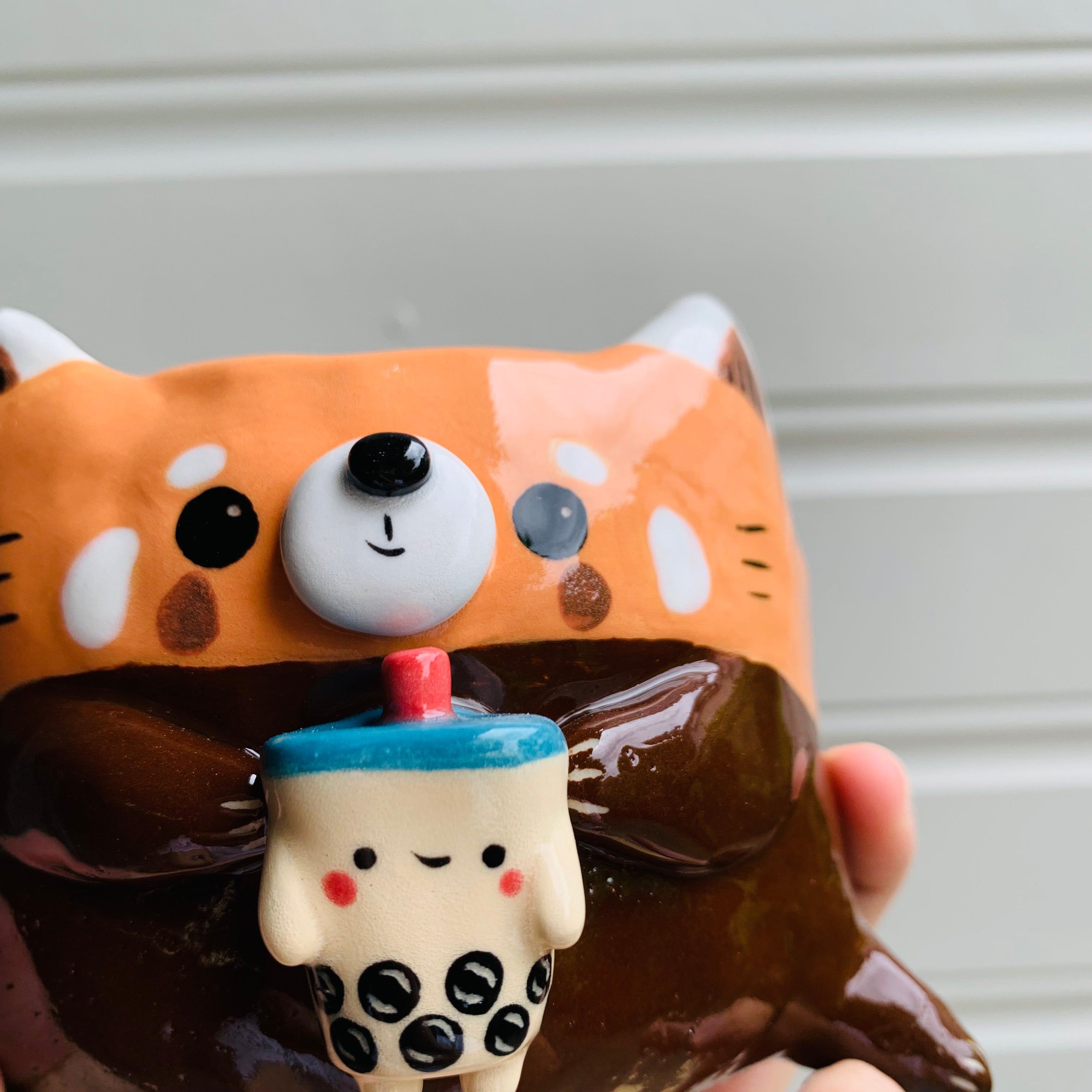 Red panda pot with bubble tea friend