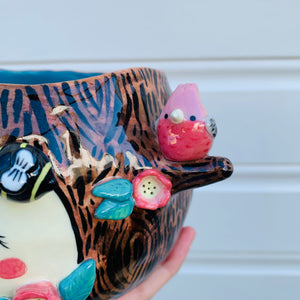 Happy flowery tree with bees, bunny and pink galah planter