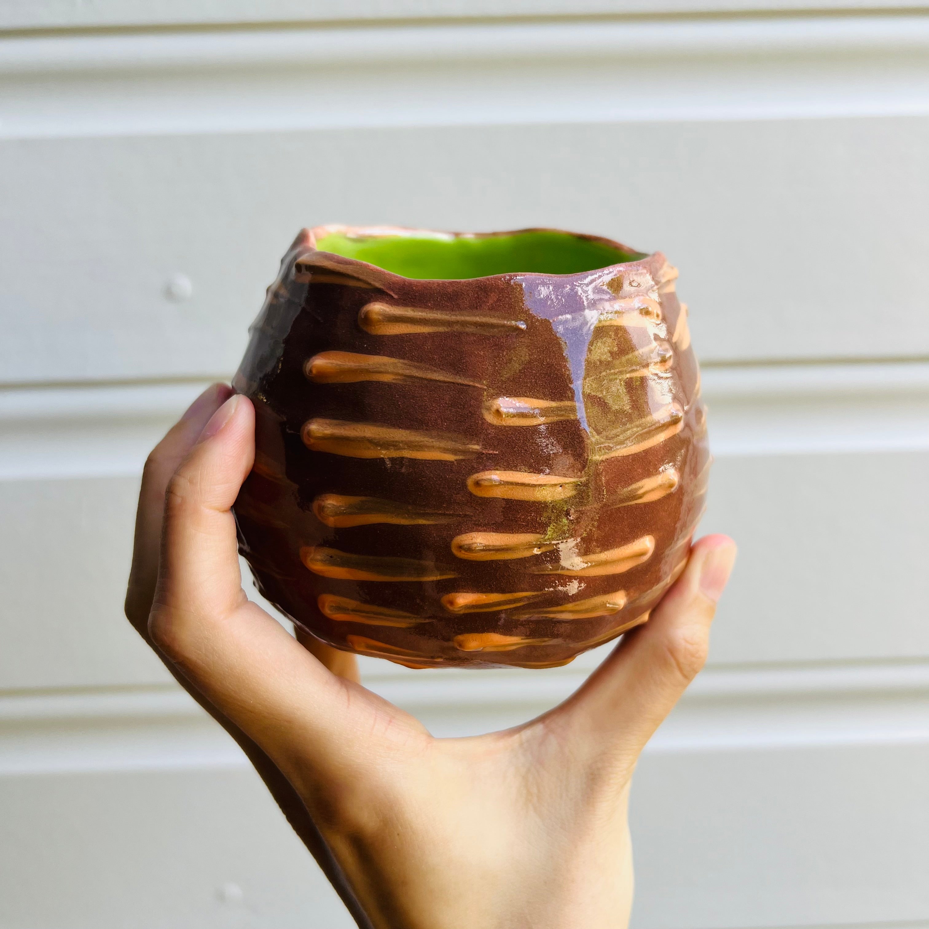 Flowery Echidna pot with puggle baby