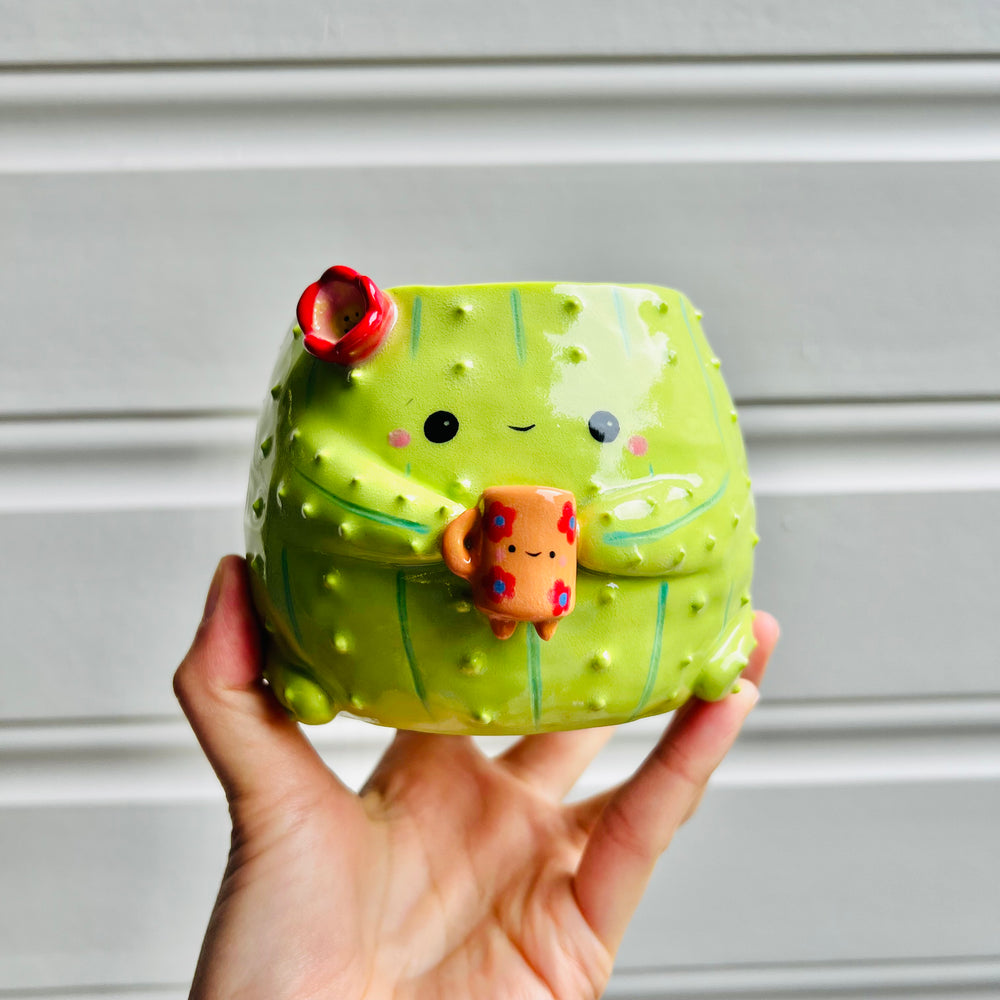 Flowery cactus pot with mug friend, photo 1 of 5