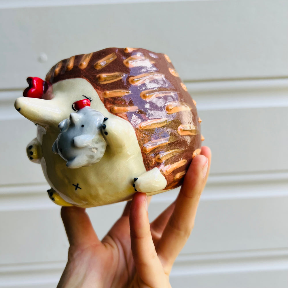 Flowery Echidna pot with Puggle baby, photo 3 of 5